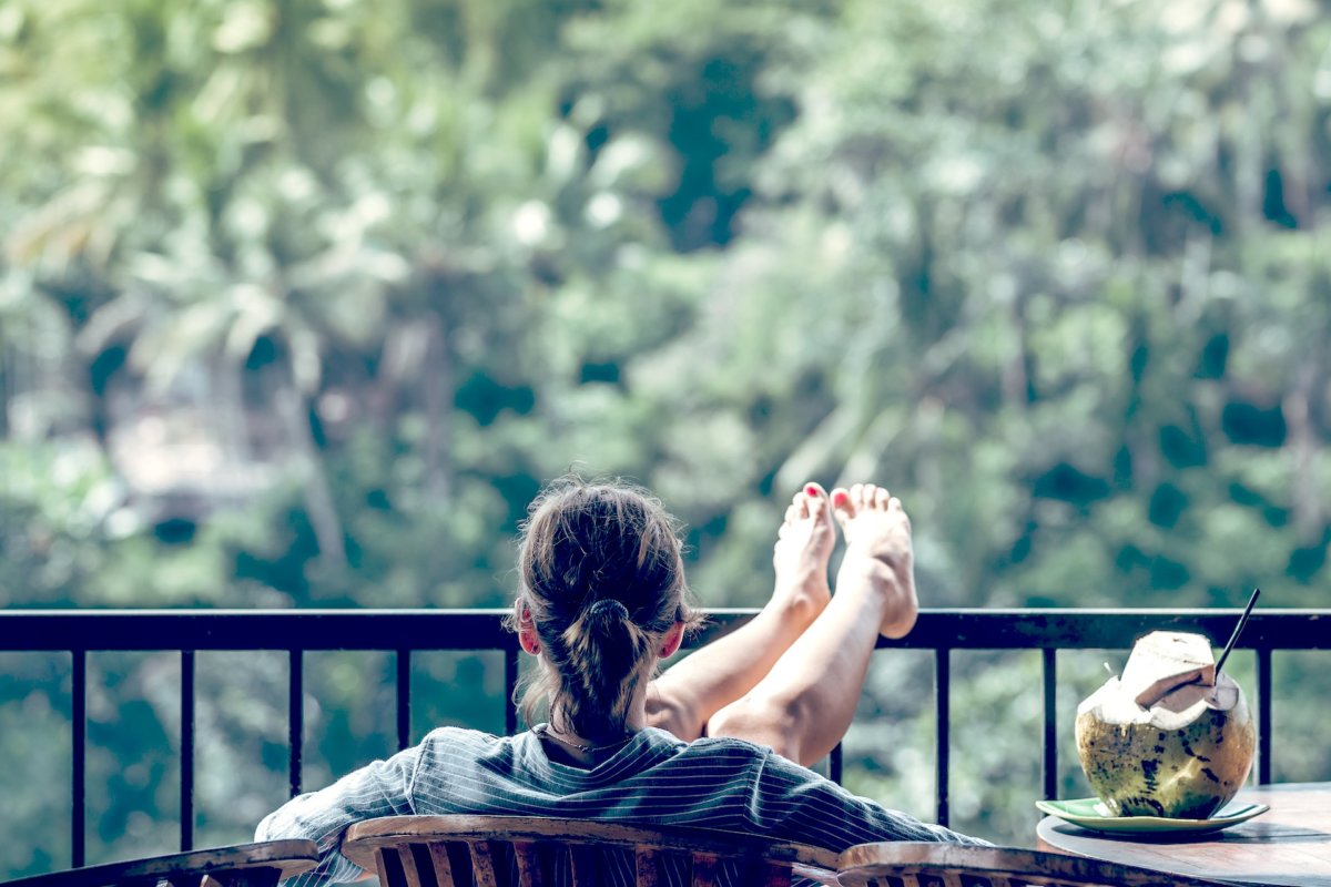 Woman relaxing - Give Acupuncture a go stock photo by Artem Beliaikin