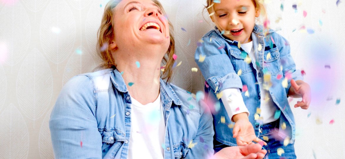 mom and daughter celebrating